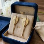 PJ Gold-Plated Ribbed Metallic Leaf Design Earrings (1) PJ Gold-Plated Ribbed Metallic Leaf Design Earrings