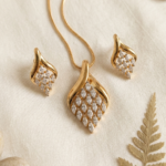 PRAREKA Elegant Leaf-Motif Gold Pendant Set